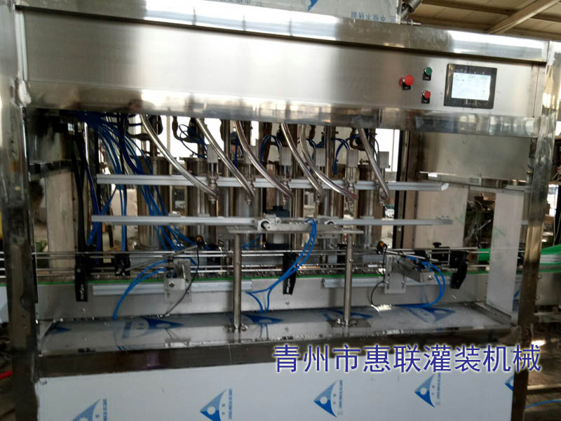 全自動(dòng)食用油灌裝機(jī) 全自動(dòng)食用油灌裝機(jī)